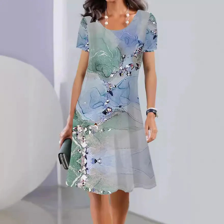 Women's light blue floral print A-line summer dress with short sleeves on a hanger.