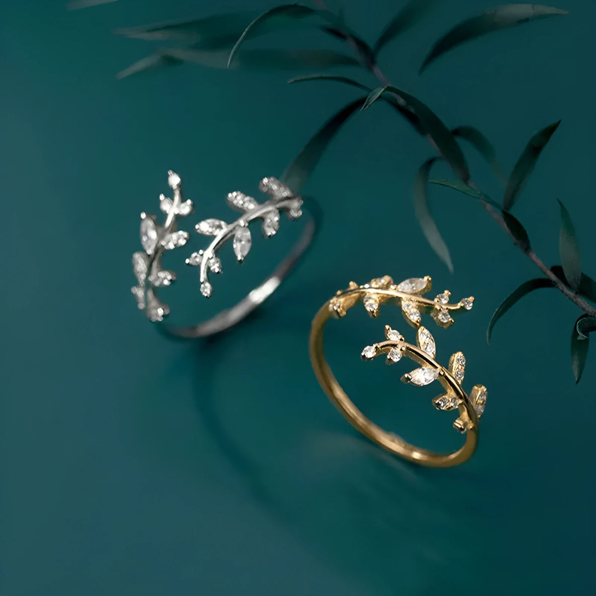 A leaf-shaped geometric copper ring with an electroplated silver or gold finish for women.