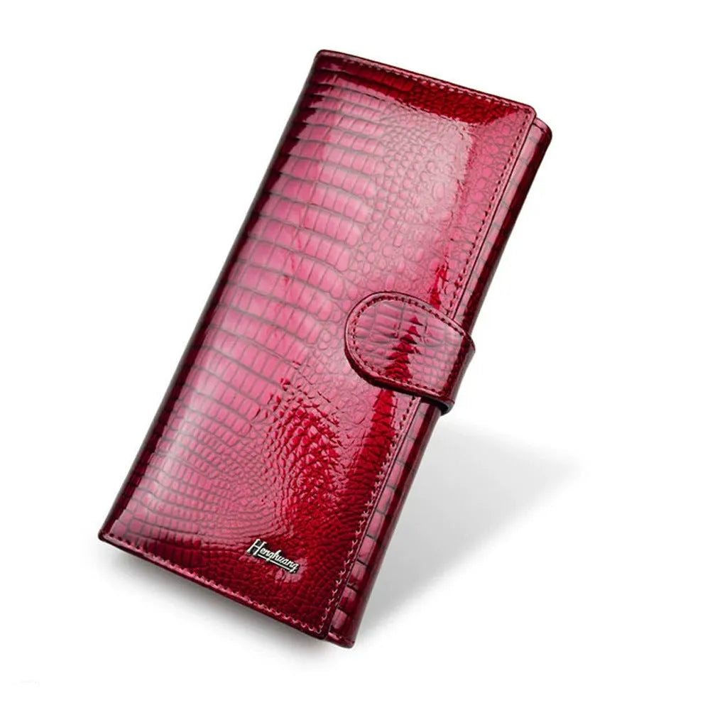 Women's leather coin purse with crocodile pattern texture in wine red, black, or red colours