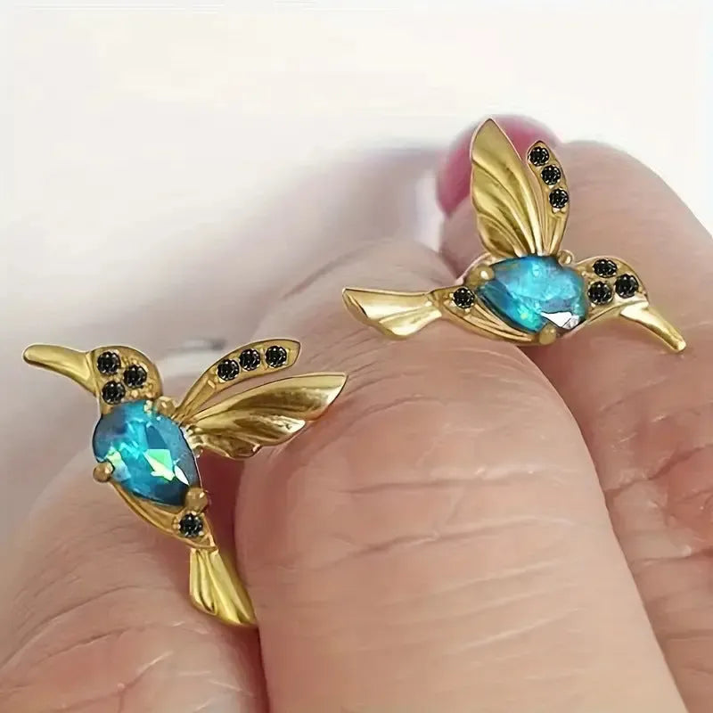 Women's long style bird hanging dangle earrings with mixed zirconium wing details in alloy construction