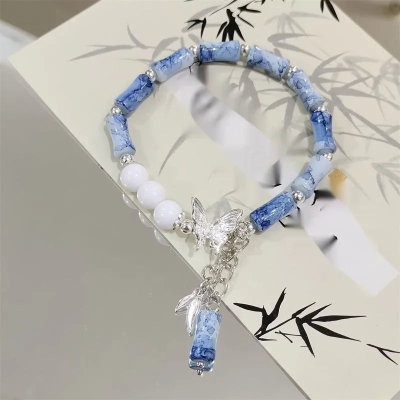 Chinese style glass bamboo leaf bracelet for women with manual craft details.