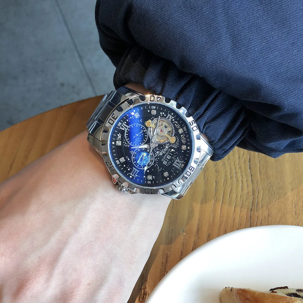 Men's silver case automatic mechanical watch with black starry dial and luminous hands