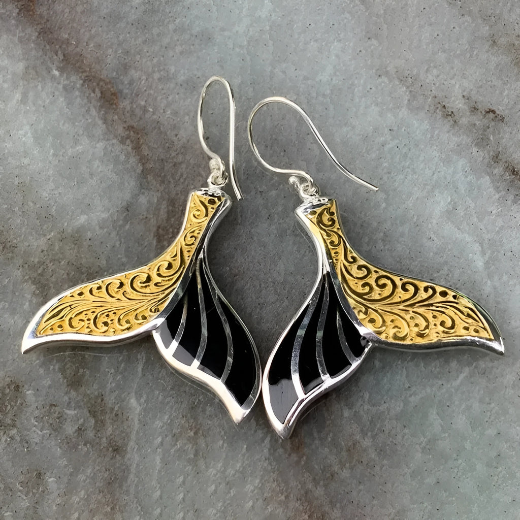 White gold colour alloy fishtail earrings with whale motif retro design