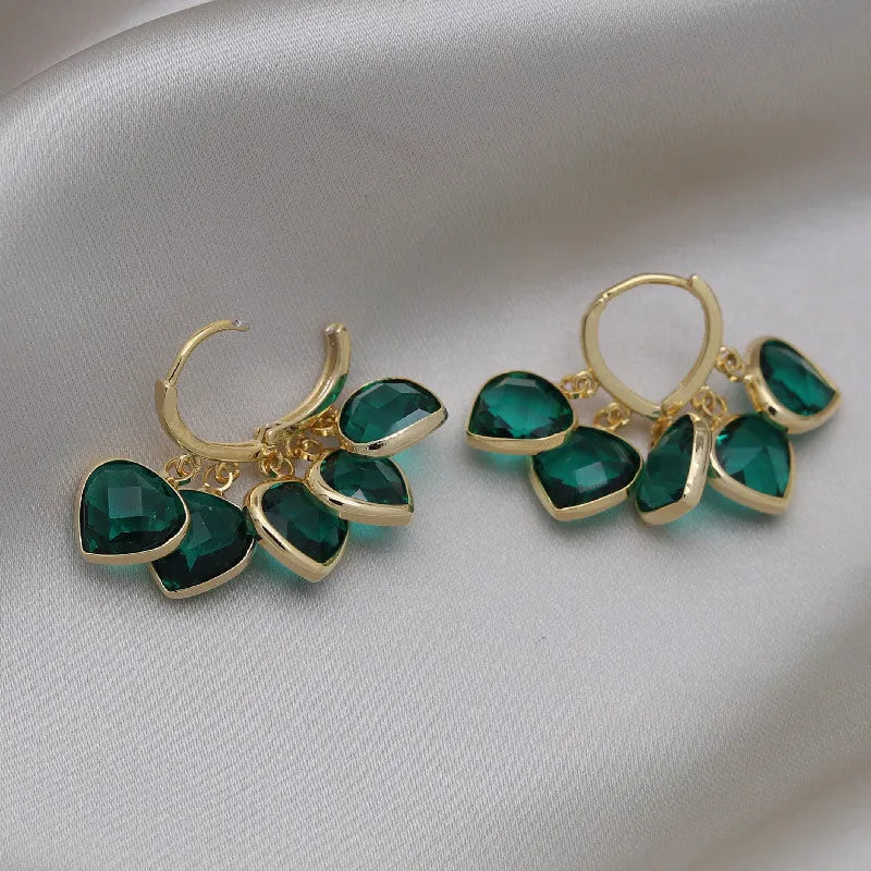 Green heart-shaped Korean style ear clip earrings with alloy gemstone detail on copper