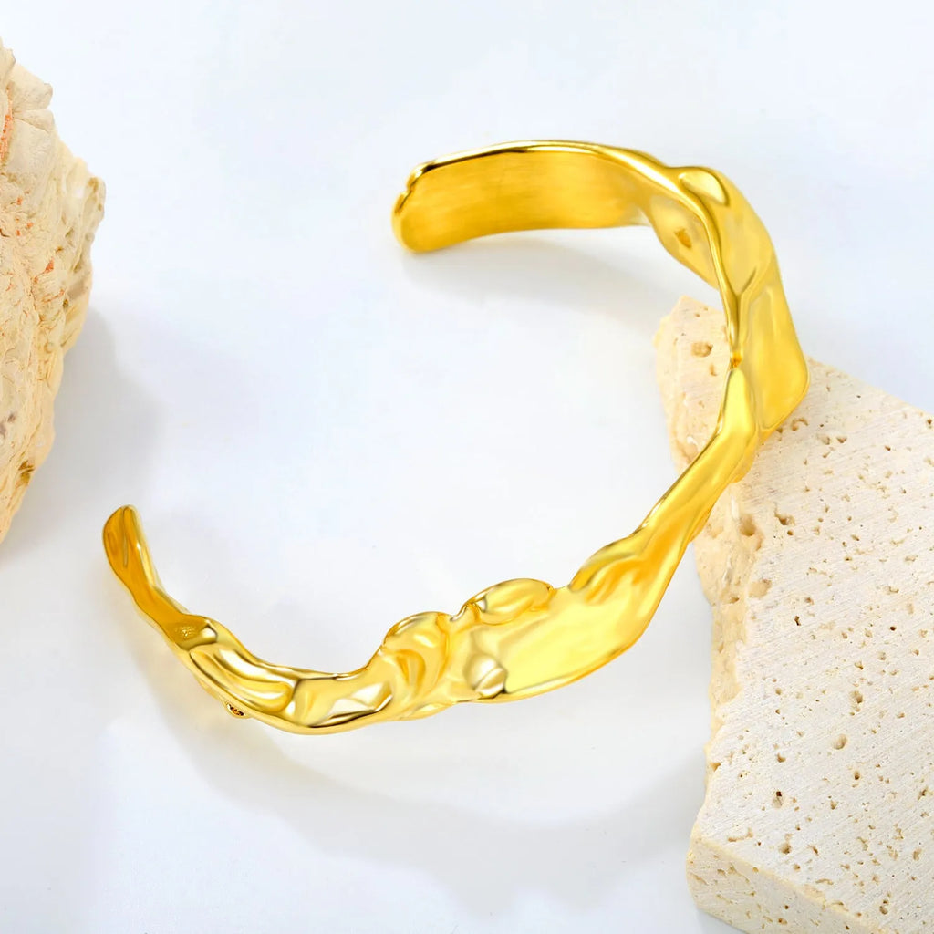 Stainless steel luxury-inspired bracelet in silver, gold, and two-tone colour options