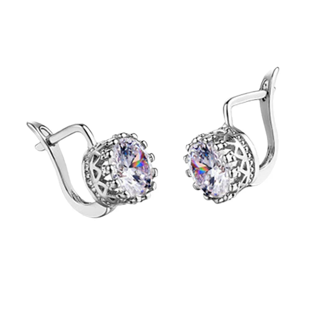 Korean retro crown-shaped clip-on earrings in rose gold and white gold colour finishes on a white background.