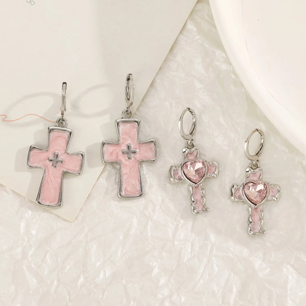 Women's alloy earrings with cross crystal design in five colour options including white, black cat, and antique silver