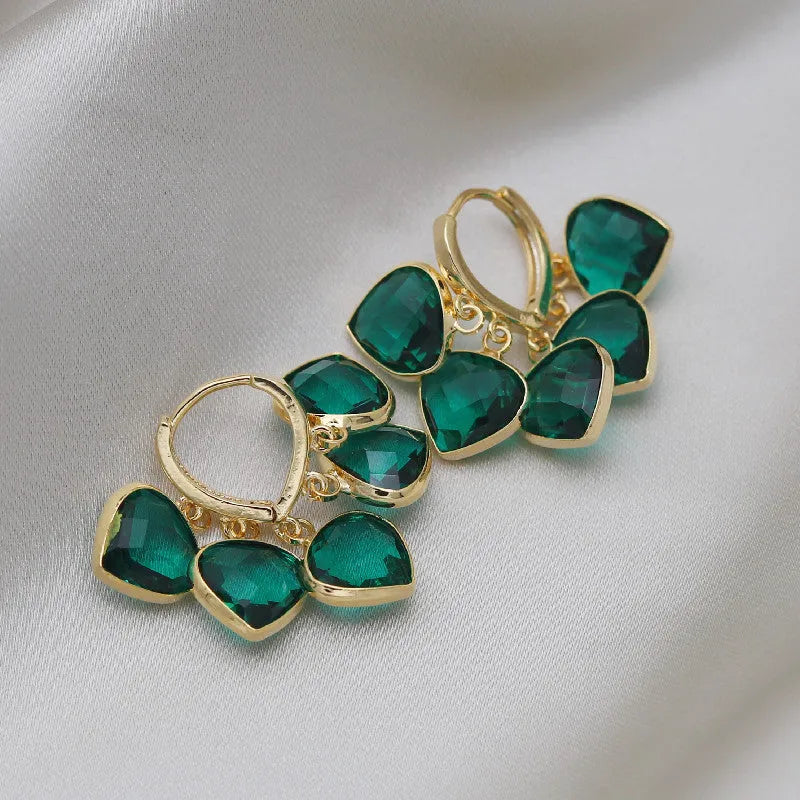 Green heart-shaped Korean style ear clip earrings with alloy gemstone detail on copper