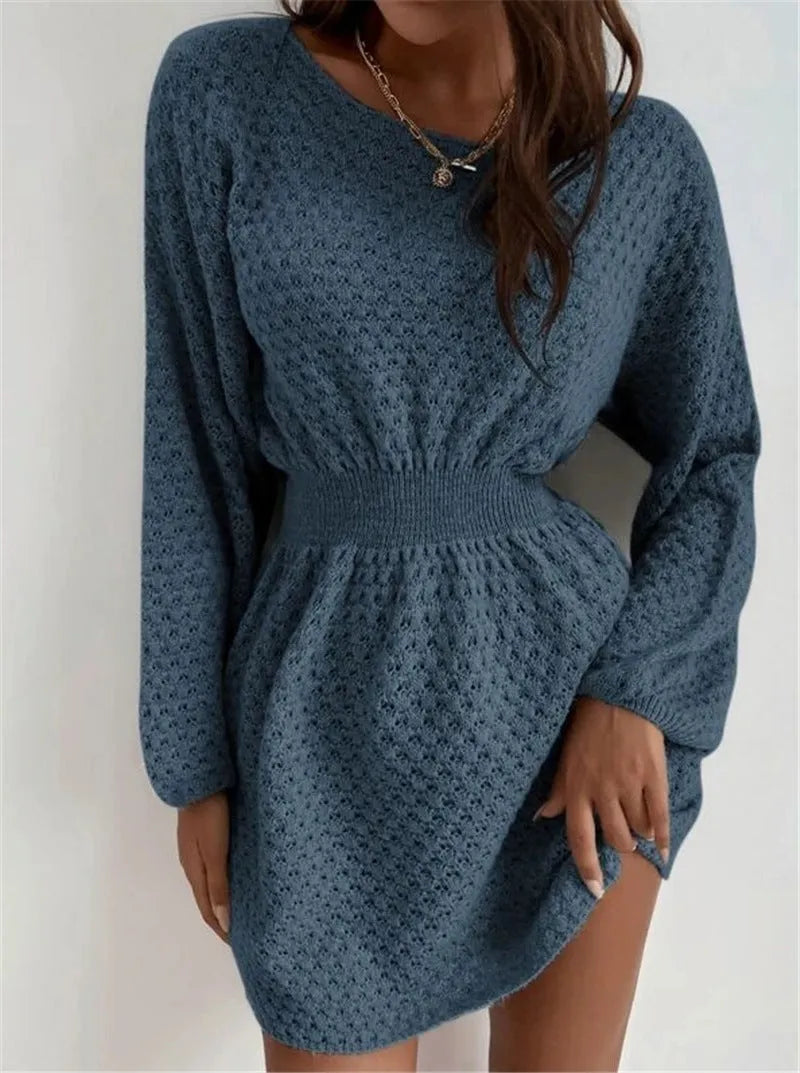 Blue women's knitted dress with hand crocheted floral details and fitted waist