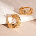 Women's geometric hollow stud earrings with twisted round design in gold or silver colour