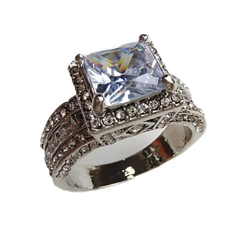 Alloy geometric women's ring with electroplated gold or white finish and round design elements