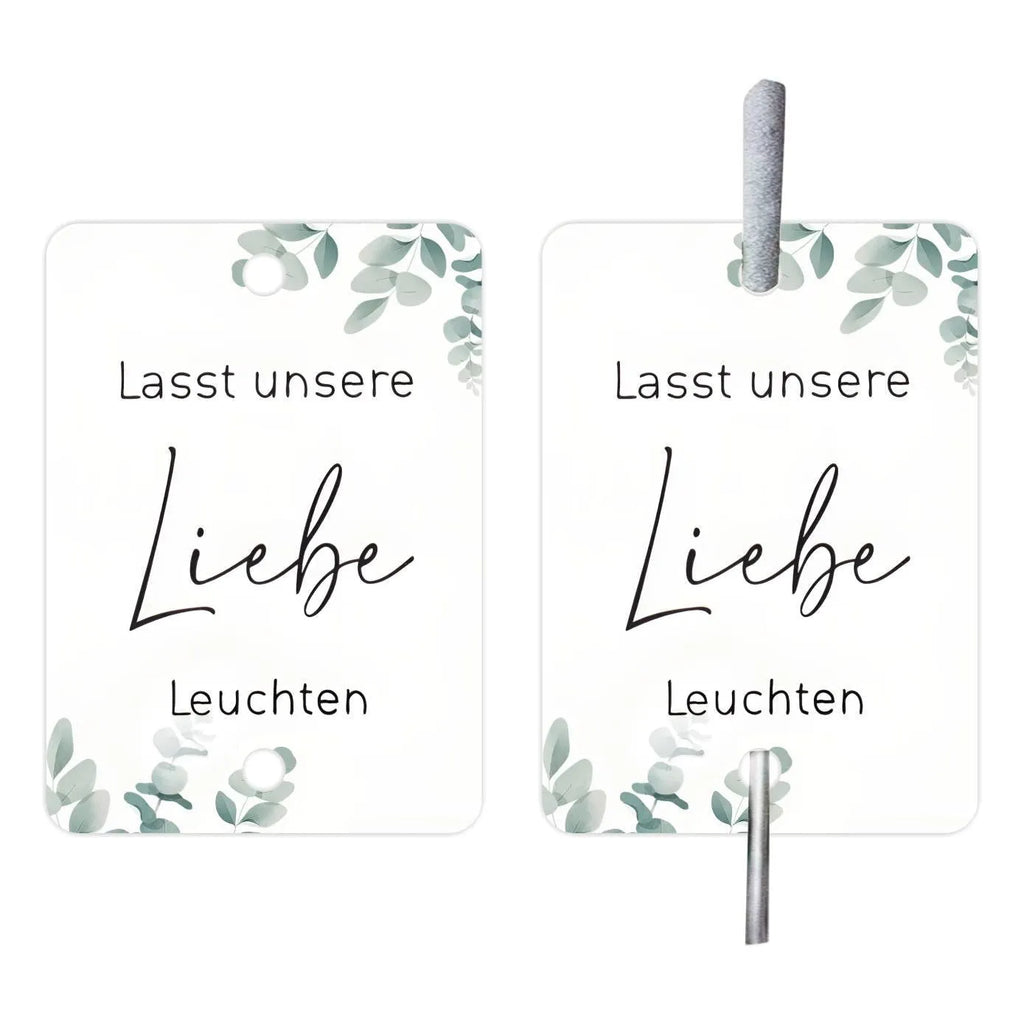 Pack of 50 white decorative paper labels with Fireworks and I Make Love print for events.