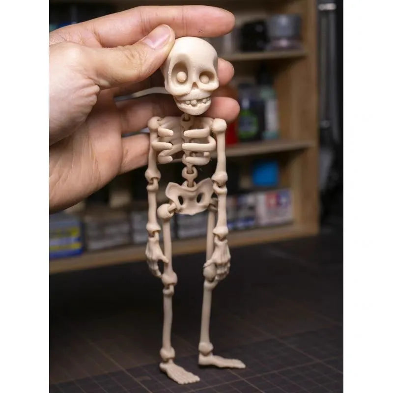 3D printed skull refrigerator magnet ornament measuring 18cm high by 4.5cm wide in multiple colour options