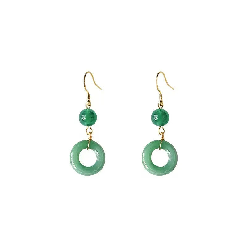 Green Chinese cheongsam peace buckle shape earrings with geometric design elements