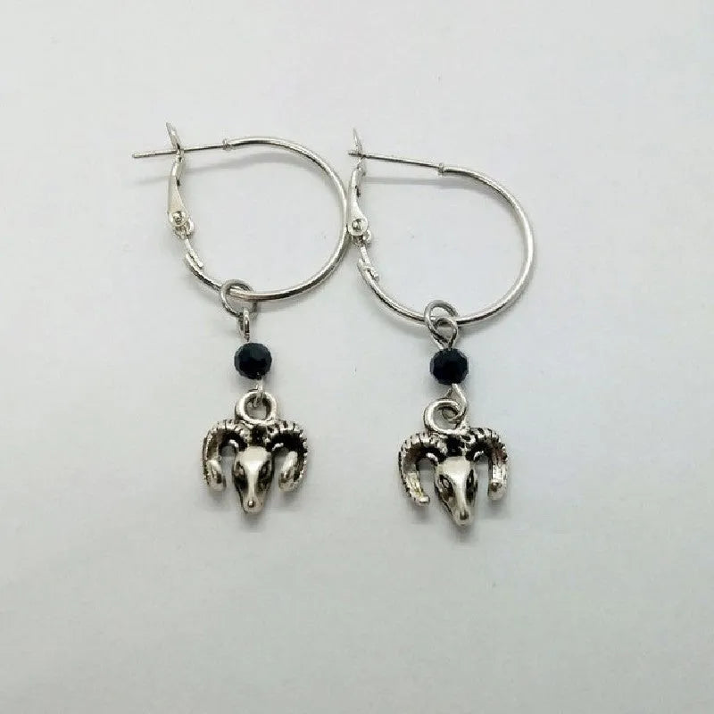 Silver tone alloy round ring earrings with Tibetan antelope design for women