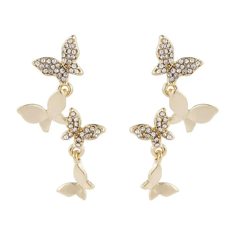 Copper butterfly earrings with four gold-colour charm drops for women