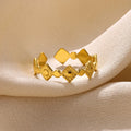 Gold geometric titanium steel women's ring with diamond pattern detailing