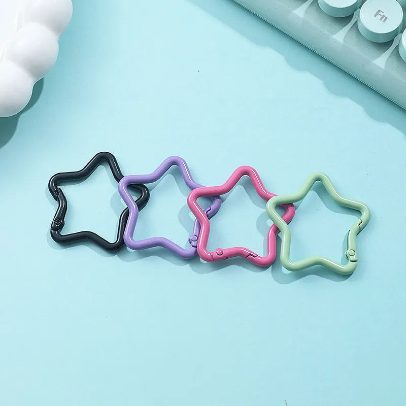 Zinc alloy five-pointed star keychain in various colour options for backpack decoration