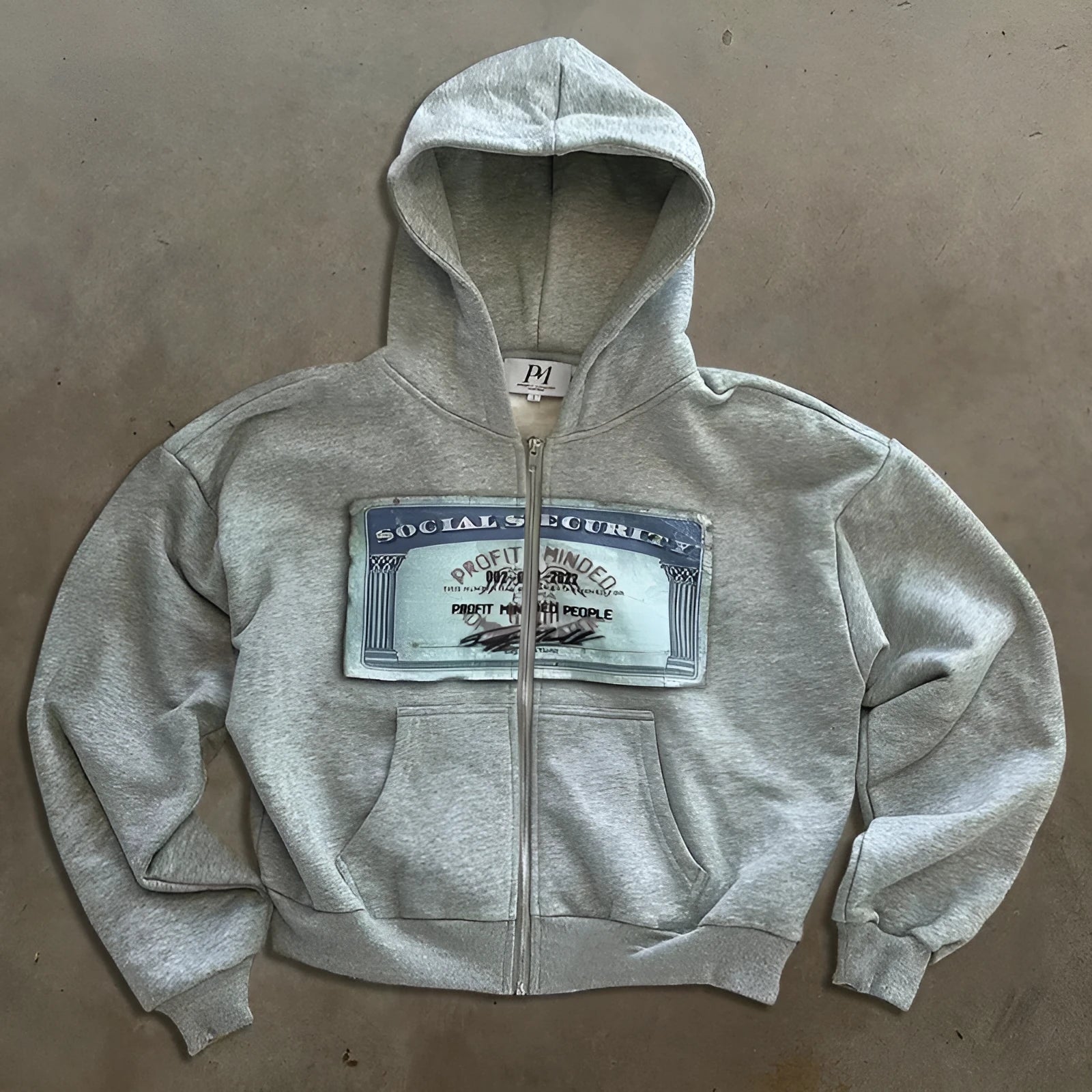Loose fit hoodie zip jacket for men and women in polyester fabric with zipper pockets