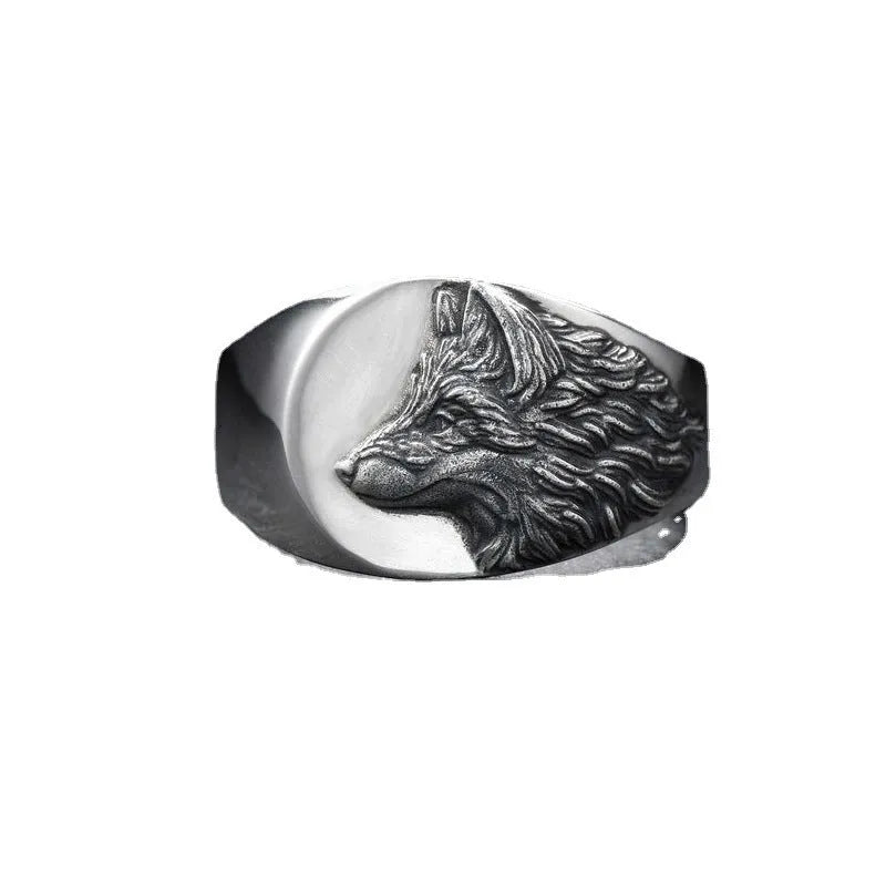 Men's geometric wolf head alloy statement ring in silver finish on a size guide showing options 6 to 12.