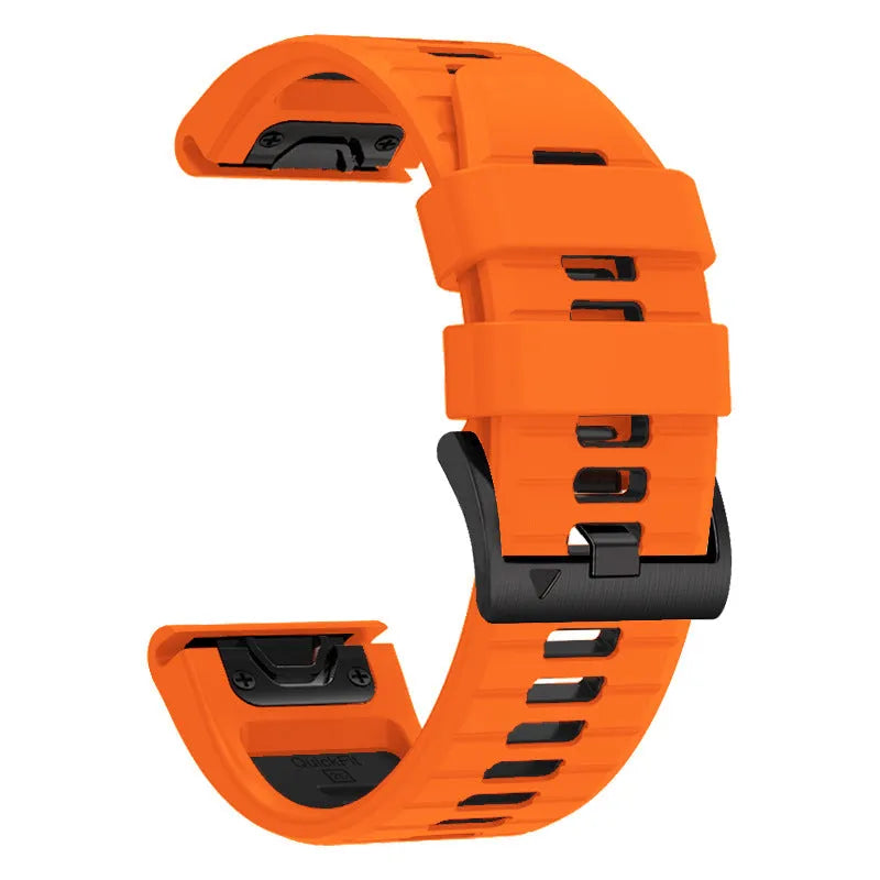 Two-tone quick release silicone strap for Garmin Fenix watch next to a watch case.