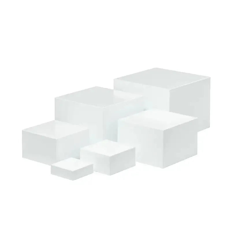 White plastic cube dessert display stand with stackable units for tiered cake and pastry presentation