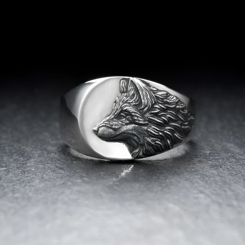 Men's geometric wolf head alloy statement ring in silver finish on a size guide showing options 6 to 12.