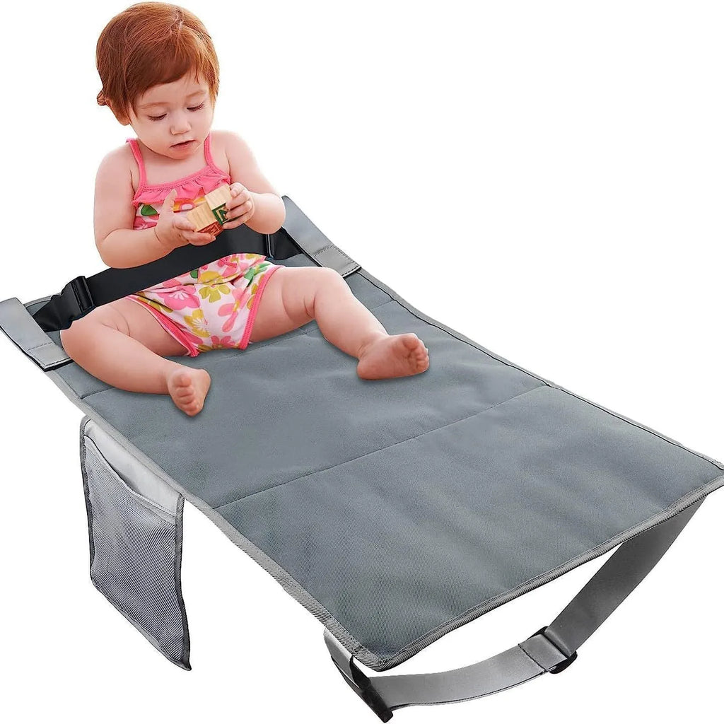 Portable blue children's aircraft pedal seat extender with drawstring pocket