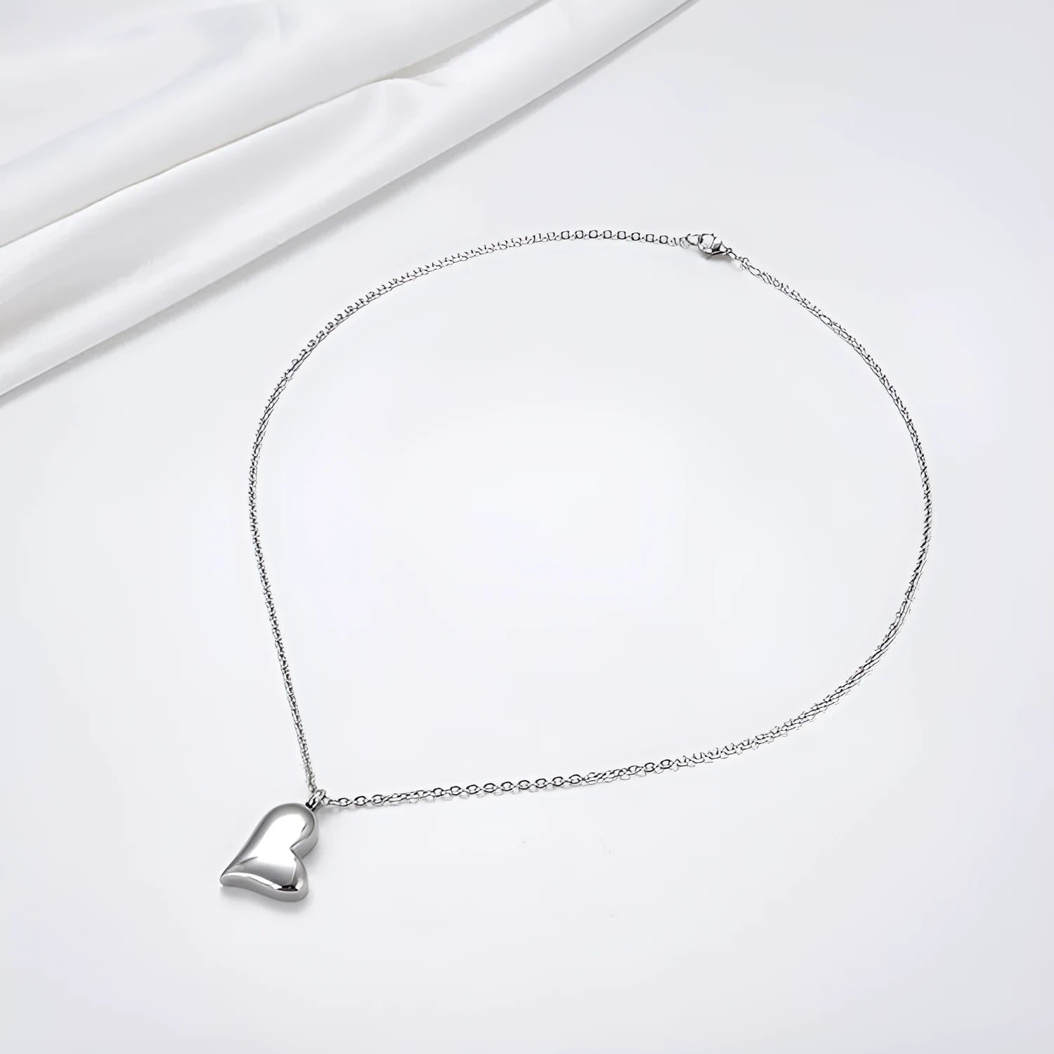 Silver stainless steel curved peach heart pendant necklace with adjustable chain