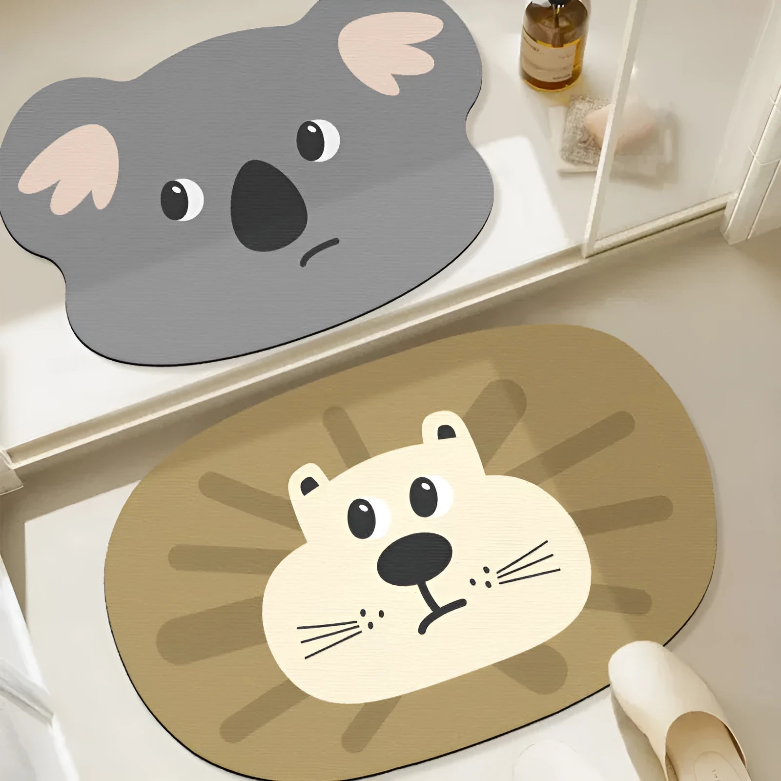 Cartoon animal design diatom oil bathroom mat in alien shape on bathroom floor.