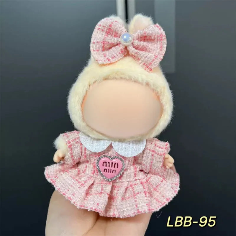 Plastic doll costume for a 17cm tall vinyl figurine on a white background.