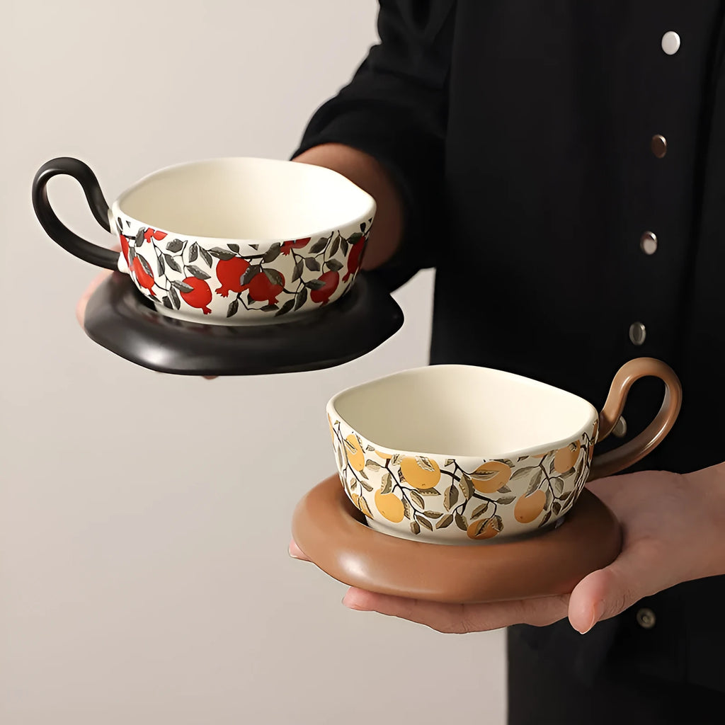 Antique-style ceramic coffee cup and saucer set in black or orange with 210ml capacity