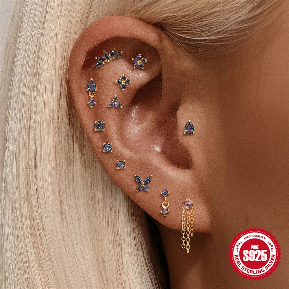 S925 sterling silver flat head thread piercing with super shiny rainbow stone in gold tone.