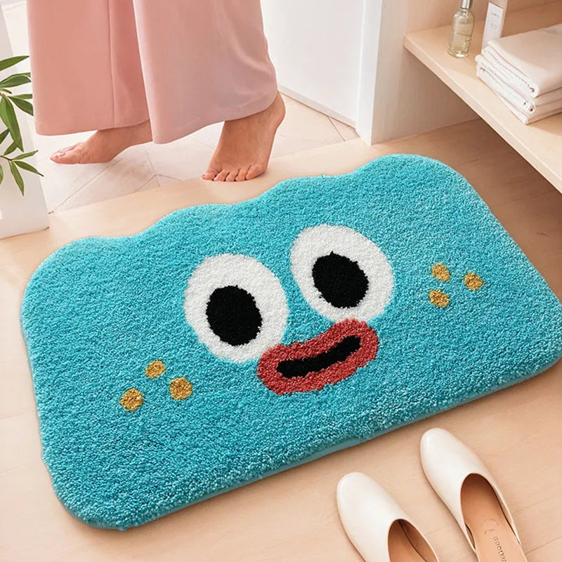 Cartoon anime Big Eye Clouds design bathroom mat in soft green colour on a bathroom floor.