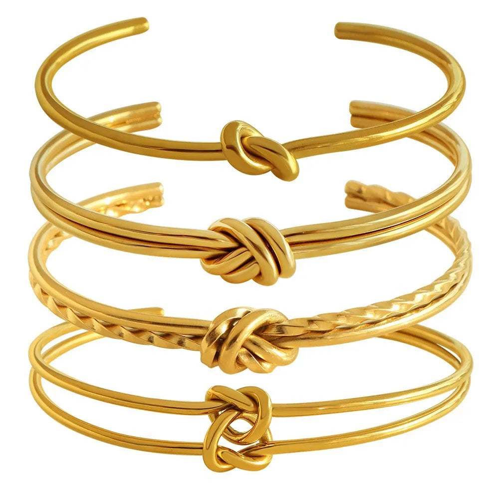 Gold or silver adjustable stainless steel women's bracelet with a C-shaped open design and double-layer knots.
