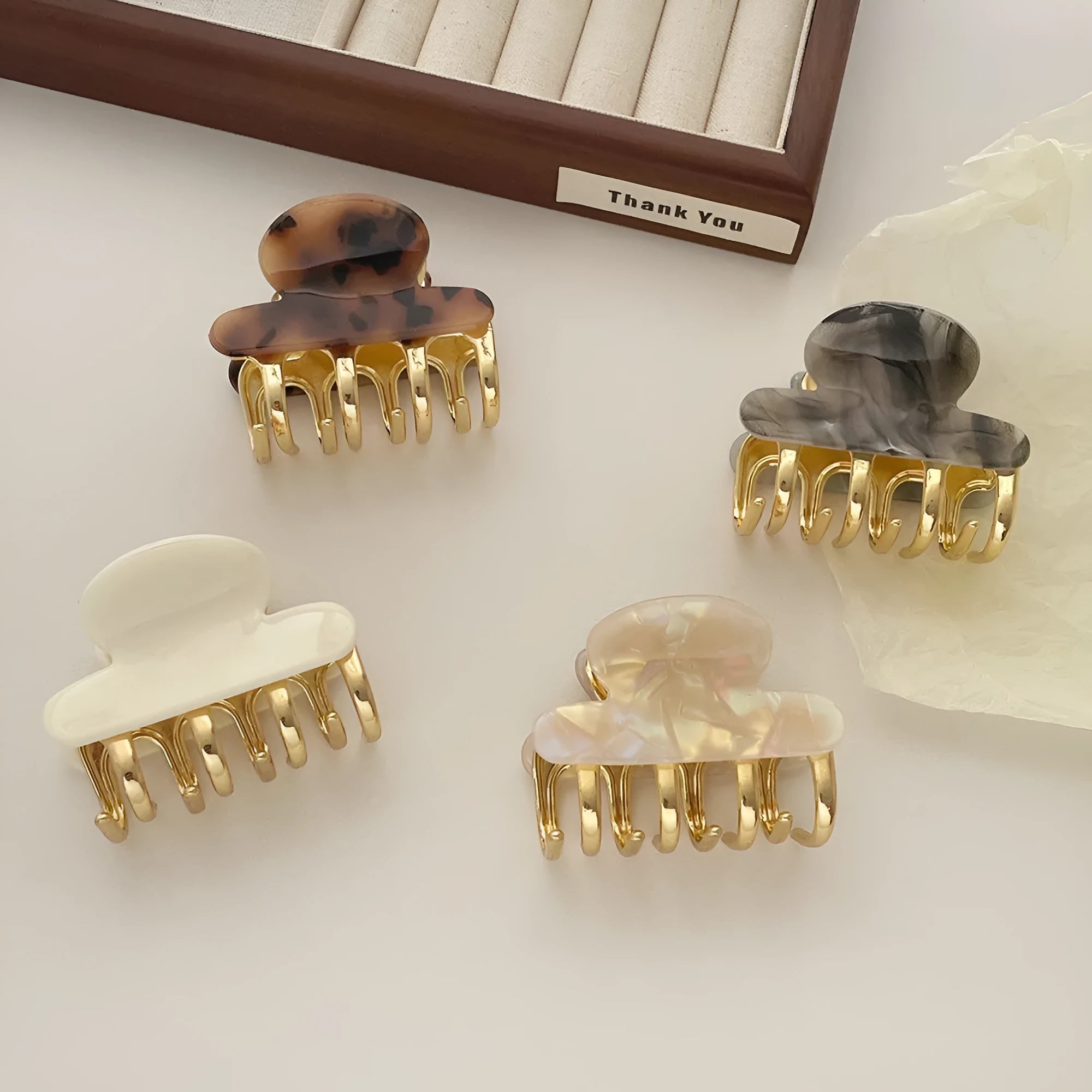 Women's retro acetate hair barrette with metal grip in leopard print pattern
