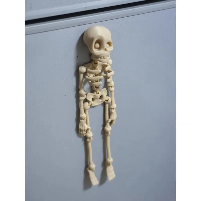 3D printed skull refrigerator magnet ornament measuring 18cm high by 4.5cm wide in multiple colour options