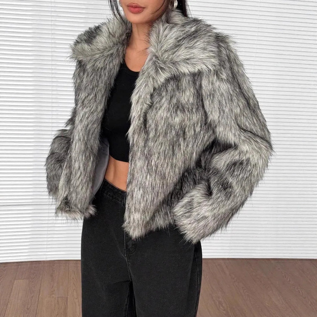 Artificial fur coat with fur collar in short length, showing thick pile construction and cute style design