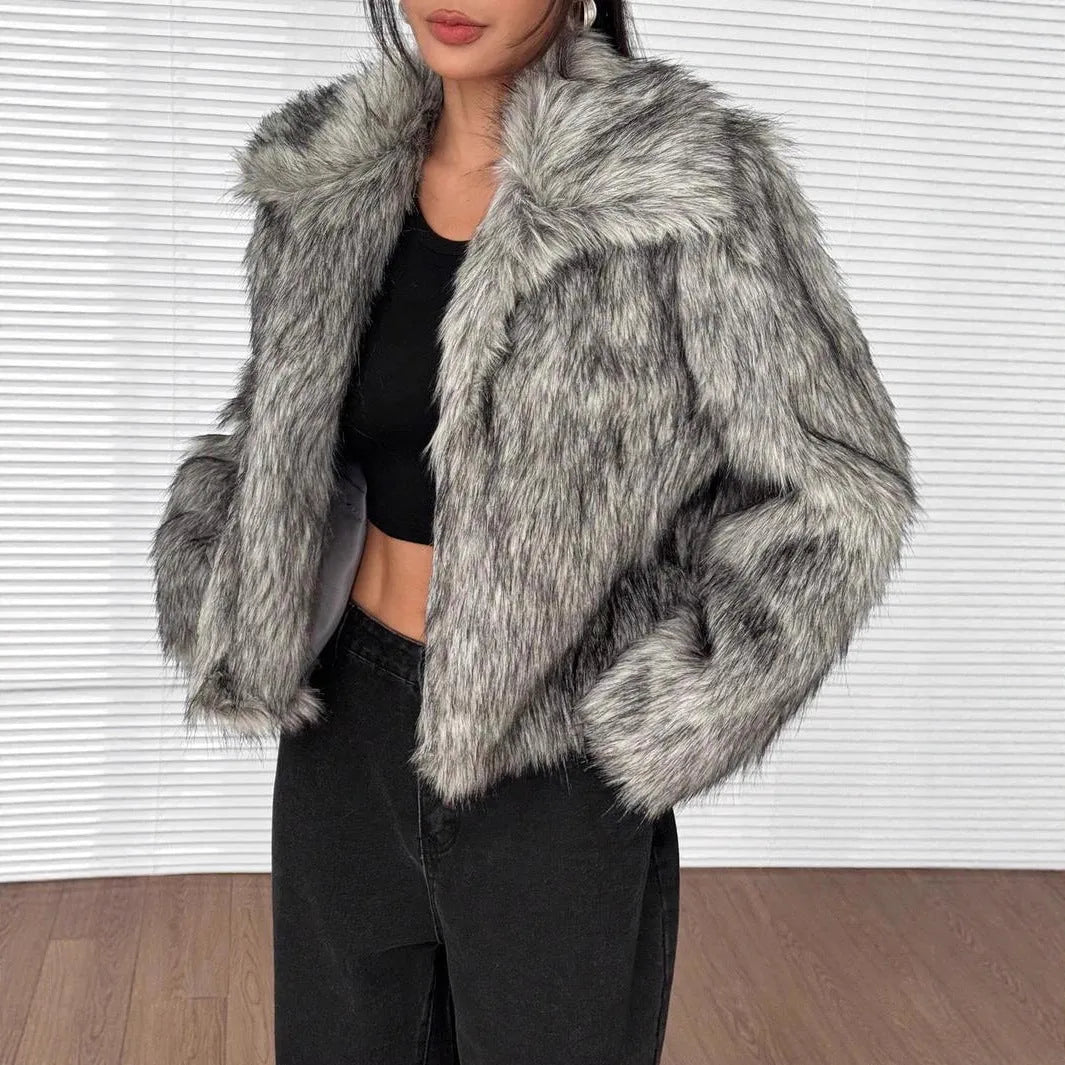 Artificial fur coat with fur collar in short length, showing thick pile construction and cute style design
