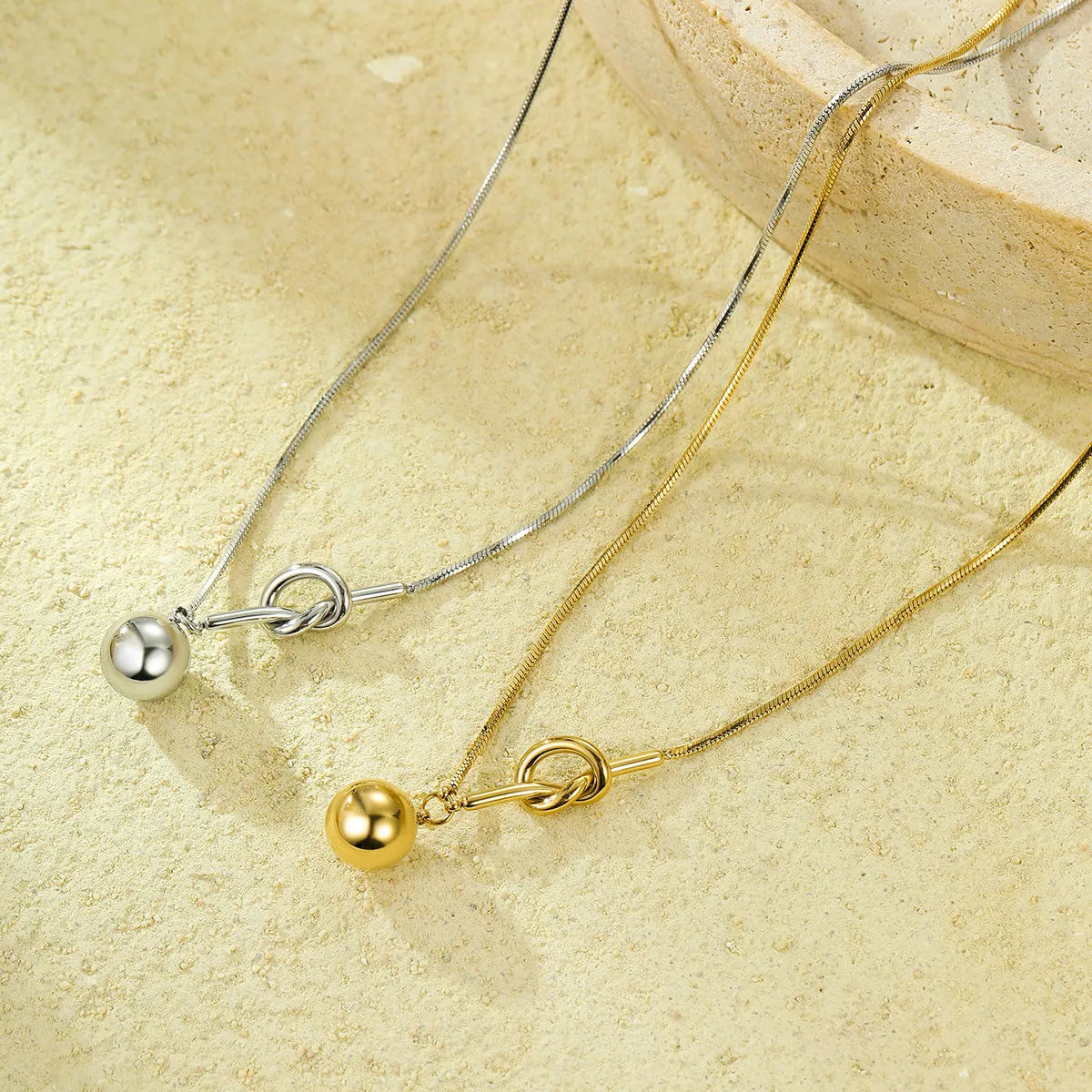 Stainless steel 18K electroplated winding ball pendant necklace with alloy chain for women, fashion OL style