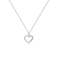 Close-up of a hollow heart-shaped sterling silver pendant on an oval chain, shown in both gold and white gold plated finishes.