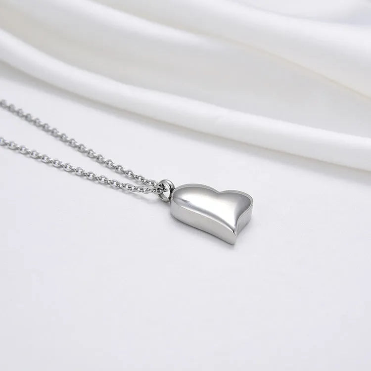Silver stainless steel curved peach heart pendant necklace with adjustable chain