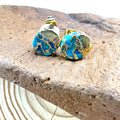 Handmade natural stone stud earrings with irregular geometric shapes on stainless steel posts