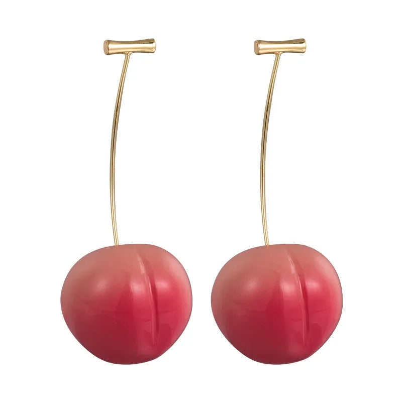 A pair of acrylic peach-shaped earrings on copper findings, shown in small and large size options.