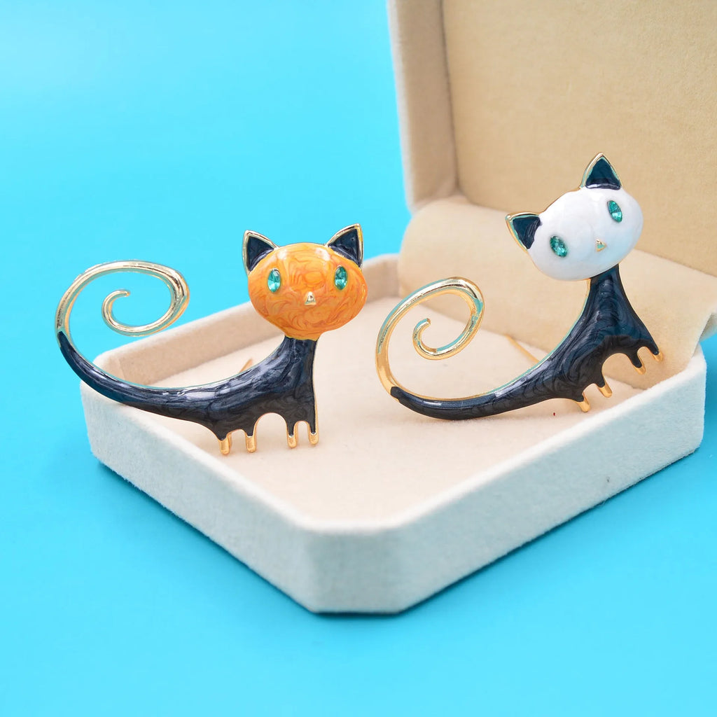 Personalised painted tail-up cat brooch in alloy metal with orange and white colour options