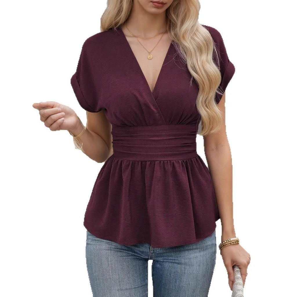 Women's solid colour V-neck polyester top with waist pleating detail in slim fit silhouette