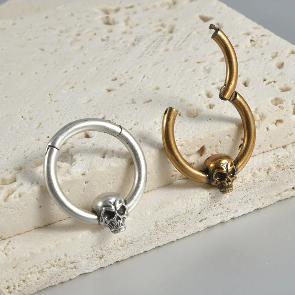 Antique silver and gold punk copper earrings with ghost head designs