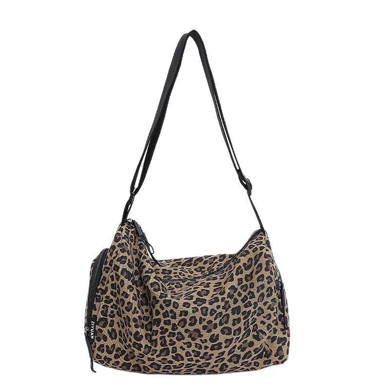 Leopard print sports messenger shoulder bag with stitching details