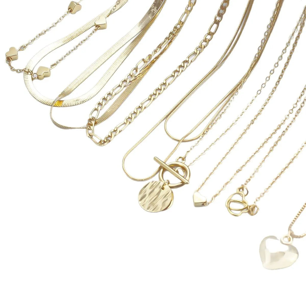 10-piece women's jewellery set with gold necklace featuring alloy pendant on snake bones chain