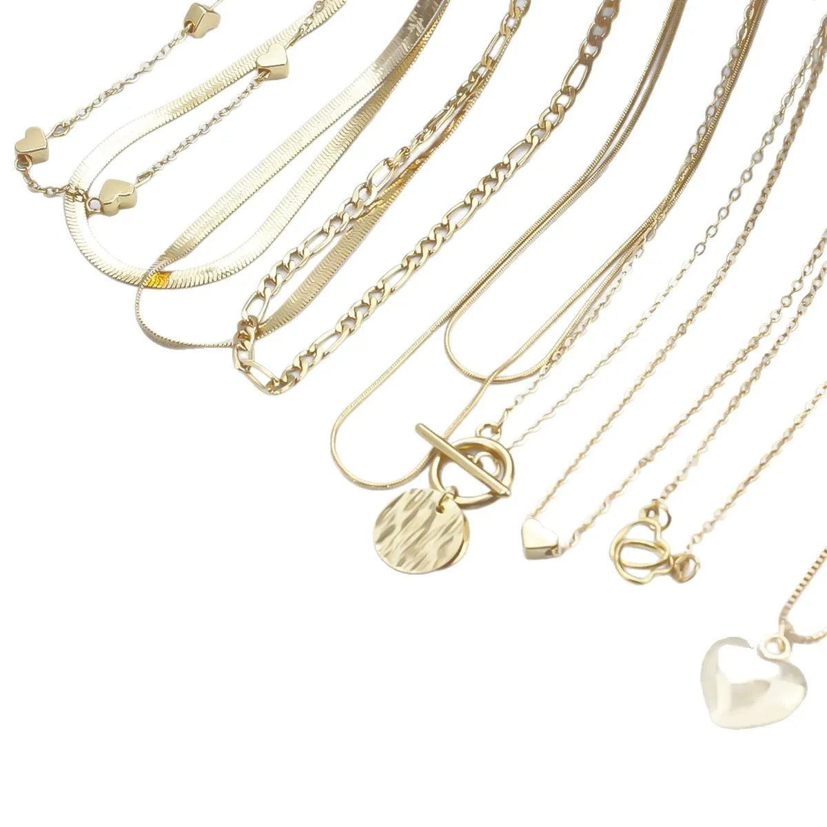 10-piece women's jewellery set with gold necklace featuring alloy pendant on snake bones chain